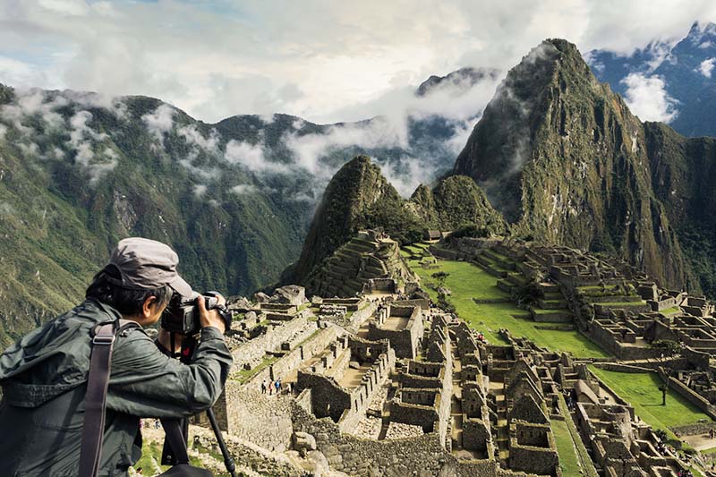 Machu Picchu Turista fotografiando Machu Picchu