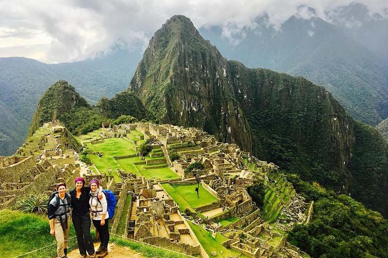 Group of tourists in Machu Picchu