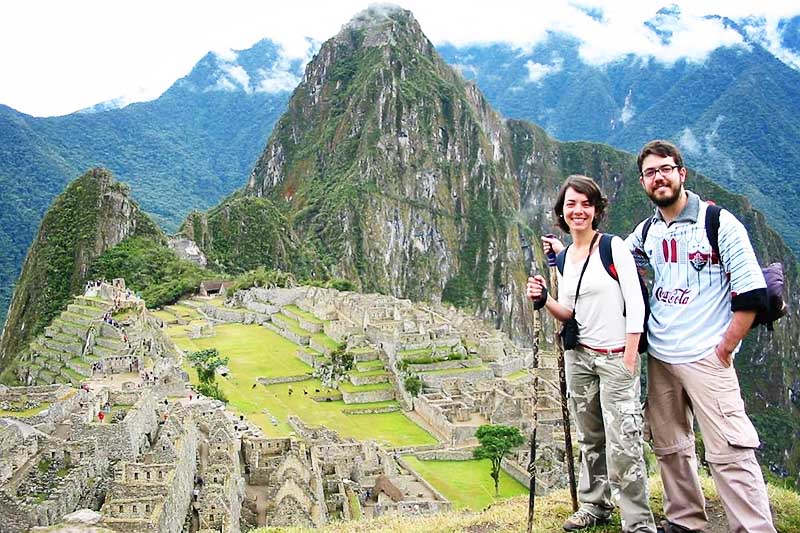 Tourist in Machu Picchu after traveling the Inca Trail