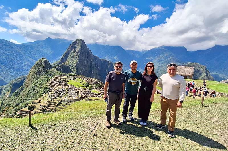 Group of friends visiting Machu Picchu