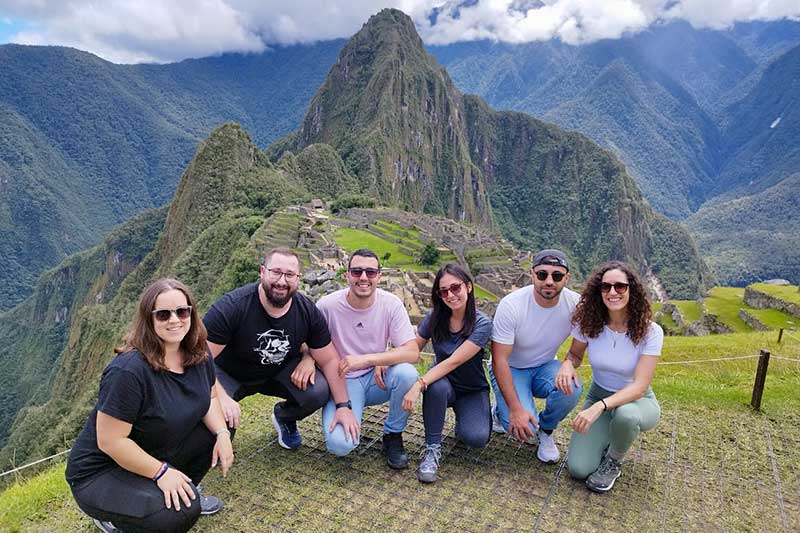 Group of friends visiting Machu Picchu