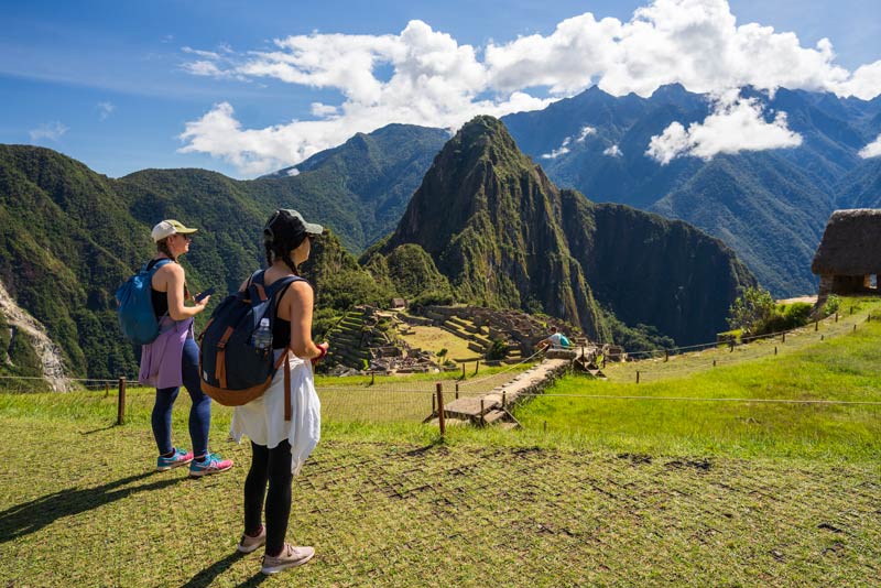 Tourists visiting Machu Picchu citadel