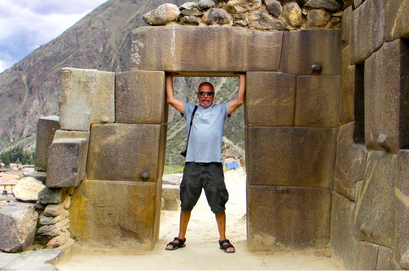 Tourist exploring the ruins of Ollantaytambo