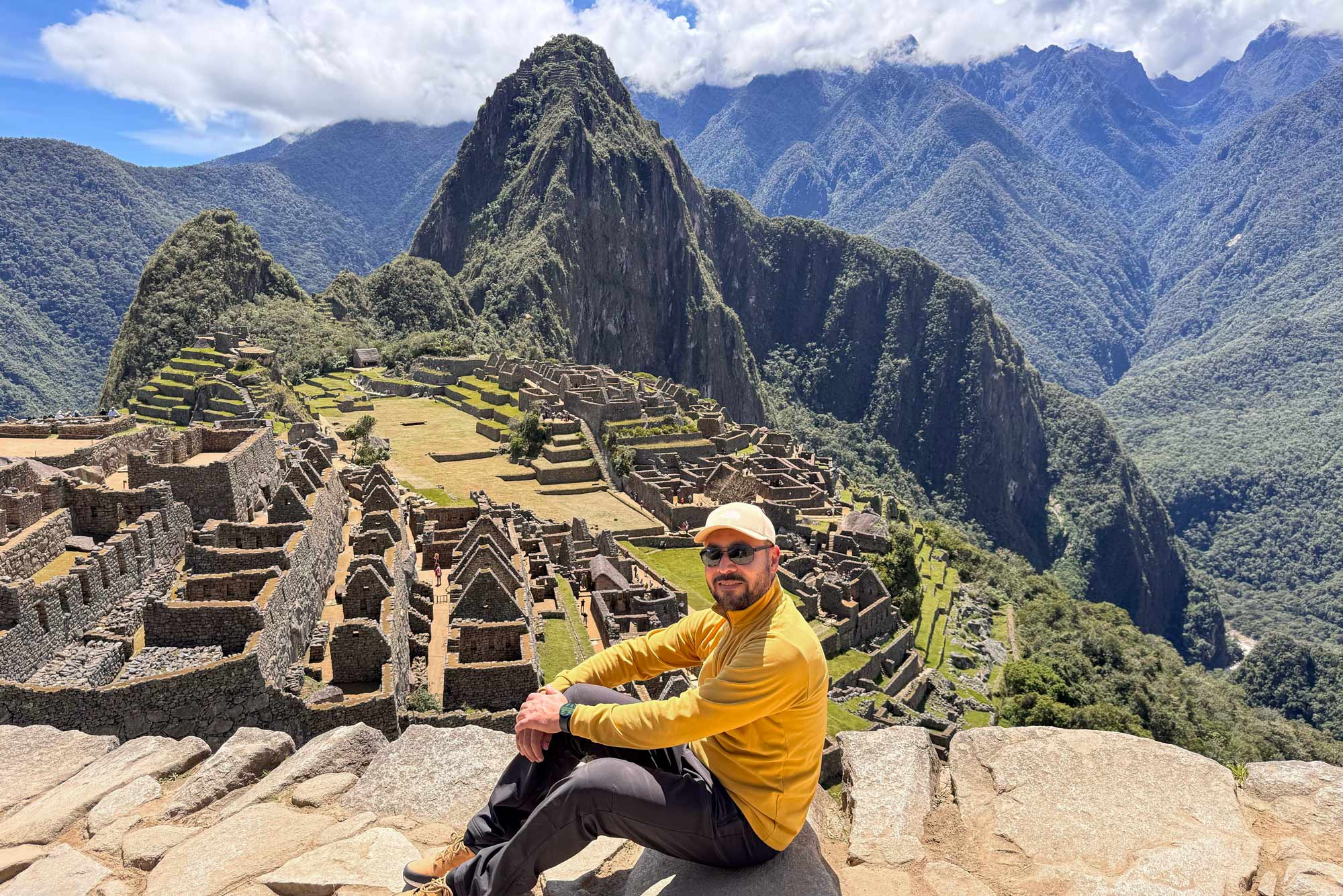 Classic photo of a tourist with Machu Picchu in the background