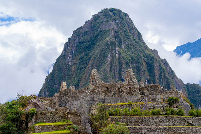 Huayna Picchu Mountain in the background of the ruins