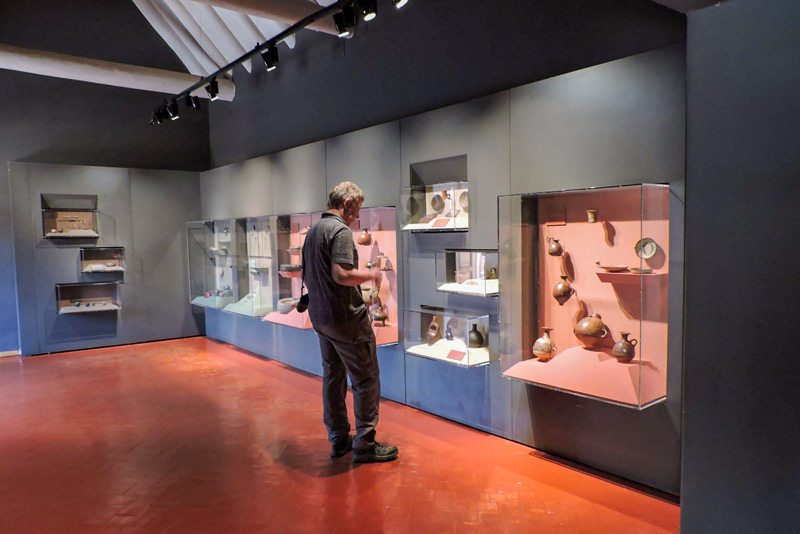 Tourist looking at ceramics at the Casa Concha Museum