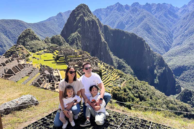 Family of visitors in Machu Picchu