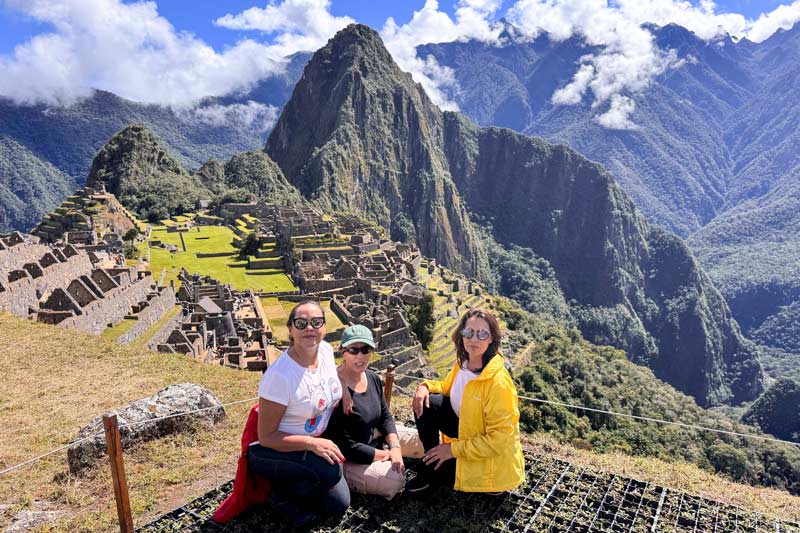 Friends visiting the wonder of the world - Machu Picchu